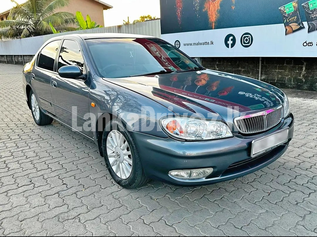 Nissan Cefiro A33 Excimo G (Grade)